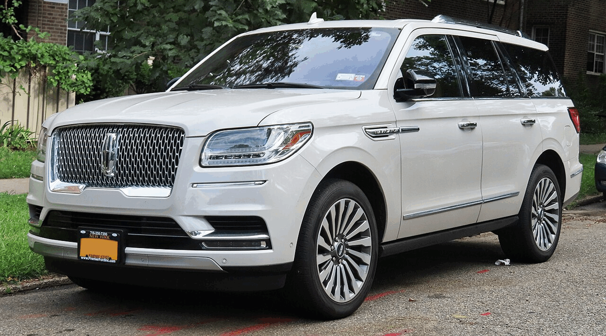 Large white SUV in urban setting