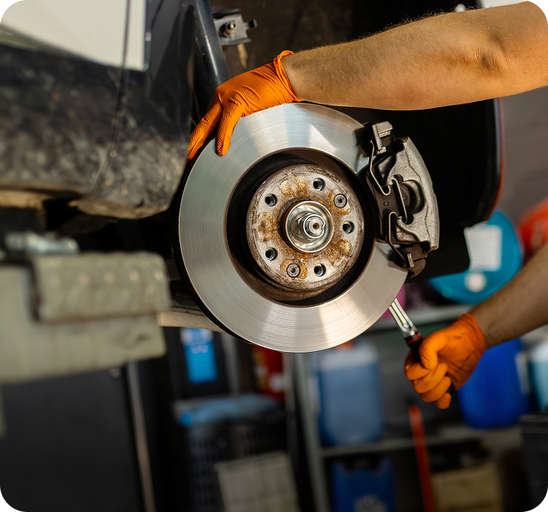 Car brake repair in progress