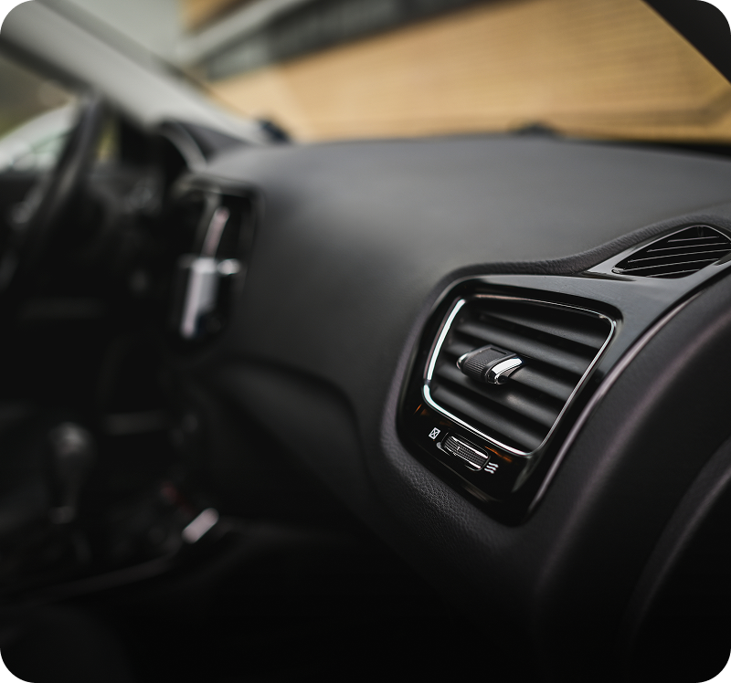 Car interior dashboard with air vent