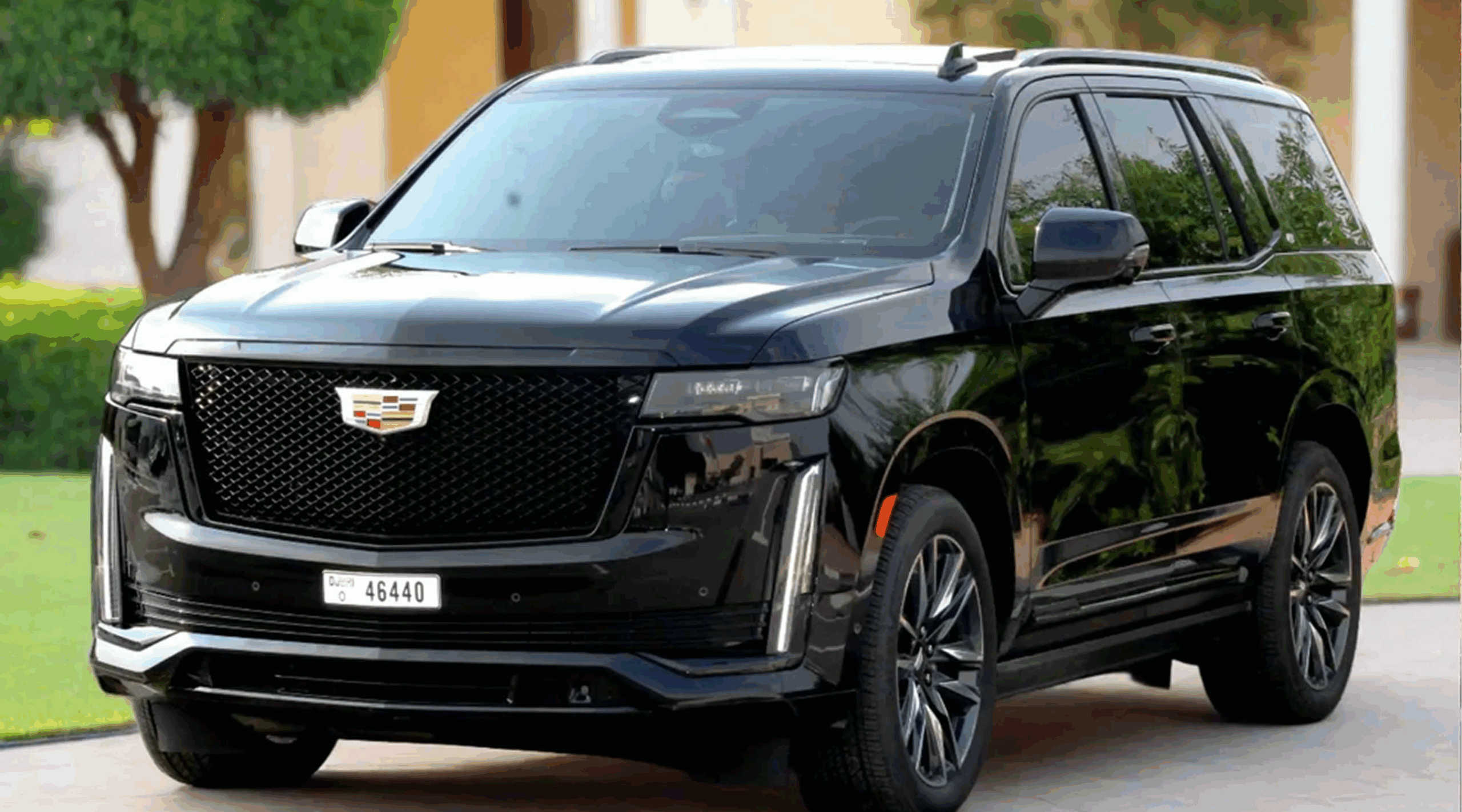 Shiny black SUV on driveway